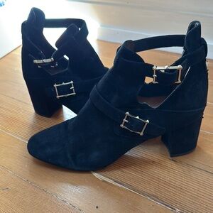 Valentino Garavani Black Heeled Rockstud Boots with Gold Buckles